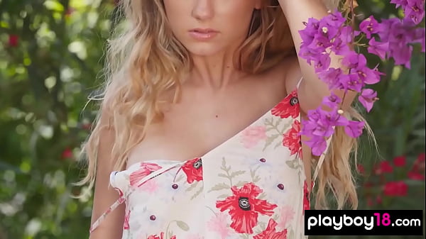 Glamorous busty blonde teen Julie Ambrose slowly slips out of her dress