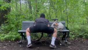 Biker In Spandex Stretching At The Park